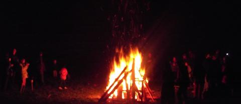 Woodies bonfire - totally necessary to reconnect round the fire, sing, talk, laugh and, of course, get scared witless.